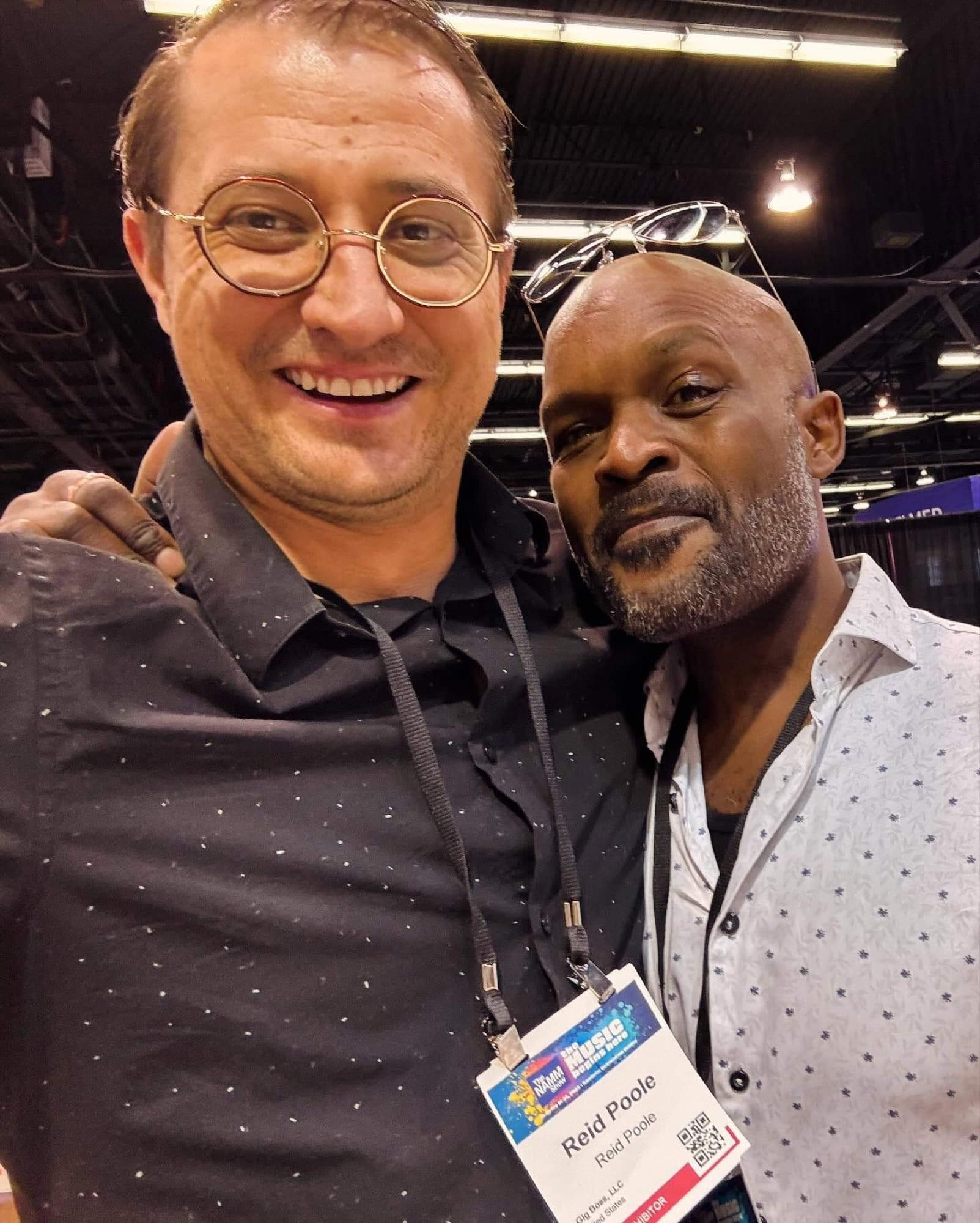 Reid Poole with a fellow musician at an industry event